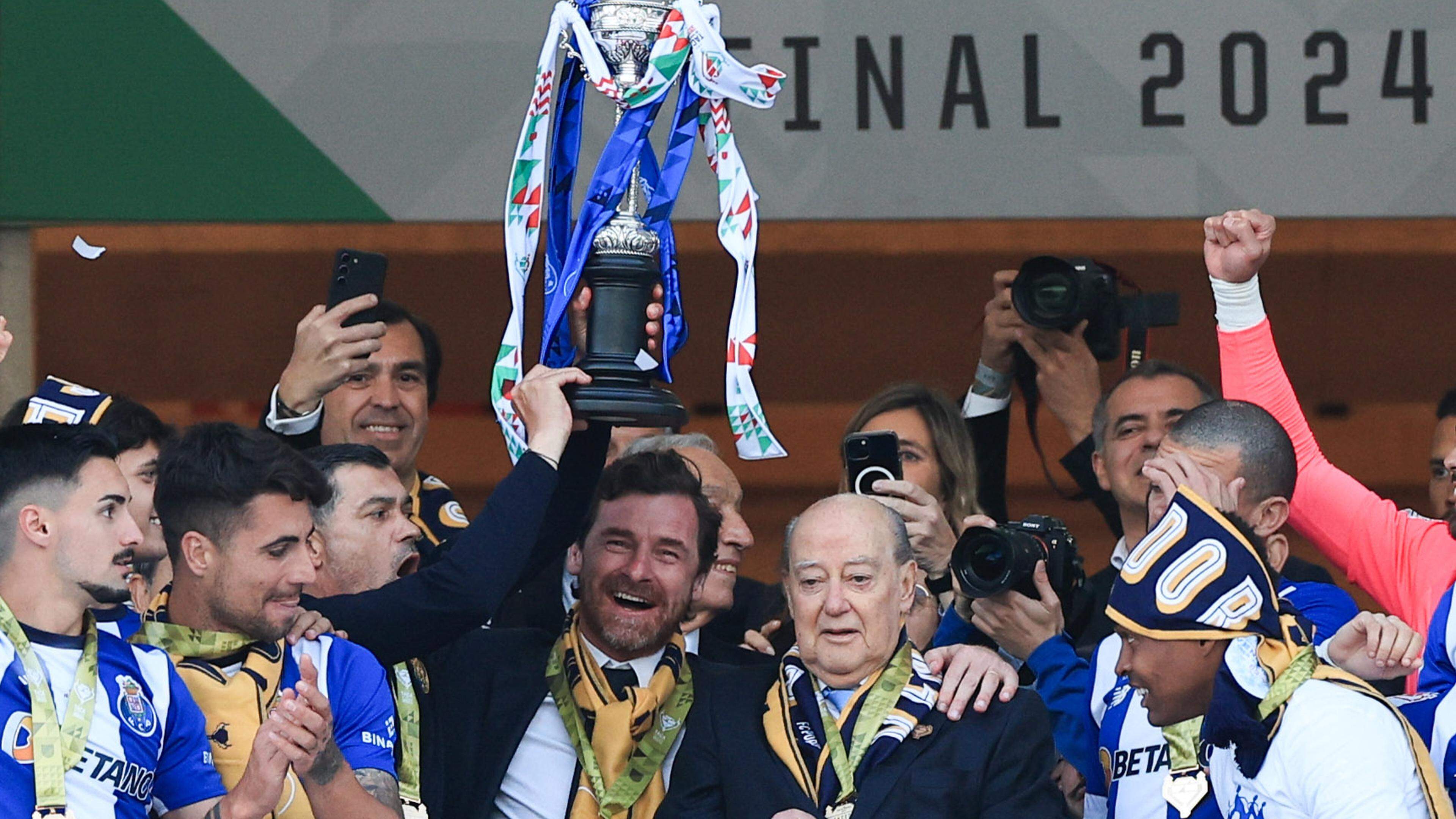 FC Porto President Andre Villas-Boas (C-L) and former President Jorge Nuno Pinto da Costa (C-R) hold the trophy after their team wins the Portuguese Soccer Cup final match between FC Porto and Sporting CP at Jamor Nacional stadium in Oeiras, outskirts Lisbon, Portugal, 26 May 2024. ANTONIO COTRIM/LUSA