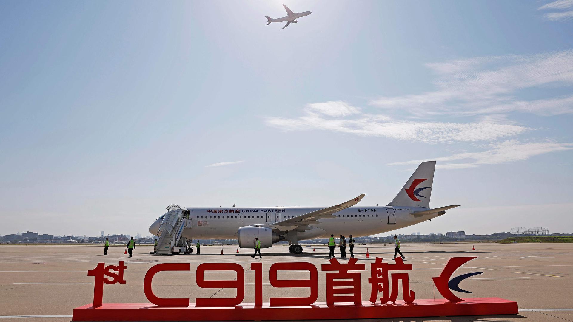 China's first domestically produced passenger jet C919 is seen before its first commercial flight from Shanghai to Beijing, at Shanghai Hongqiao Airport on May 28, 2023. China's first domestically produced passenger jet took off on its maiden commercial flight on May 28, a milestone event in the nation's decades-long effort to compete with Western rivals in the air. (Photo by AFP) / China OUT