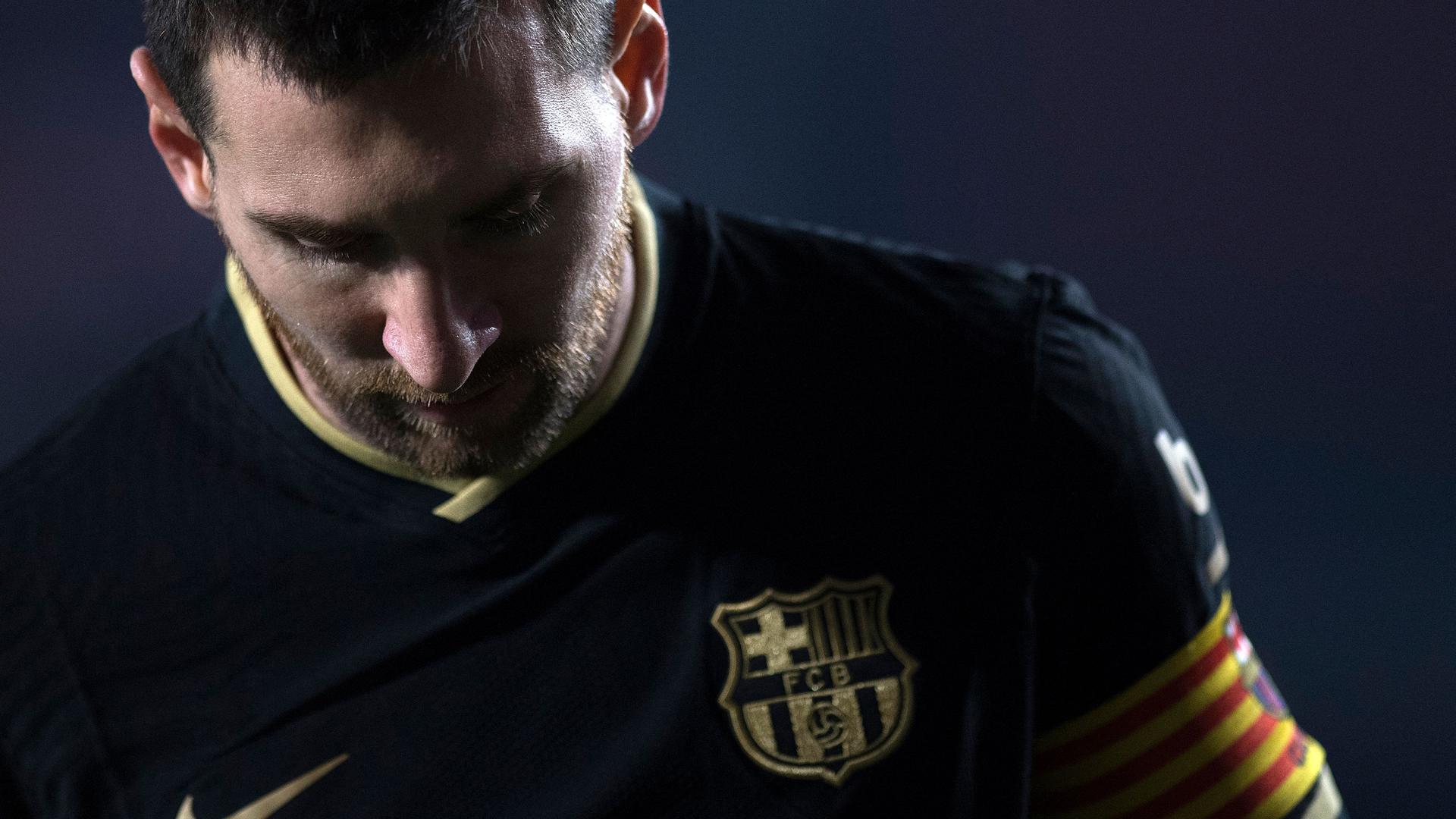 (FILES) Barcelona's Argentinian forward Lionel Messi reacts during the Spanish Copa del Rey (King's Cup) quarter-final football match between Granada FC and FC Barcelona at Nuevo Los Carmenes stadium in Granada on February 3, 2021. Lionel Messi says he will sign for Inter Miami in Spanish media interview, AFP reported on June 7, 2023. (Photo by JORGE GUERRERO / AFP)