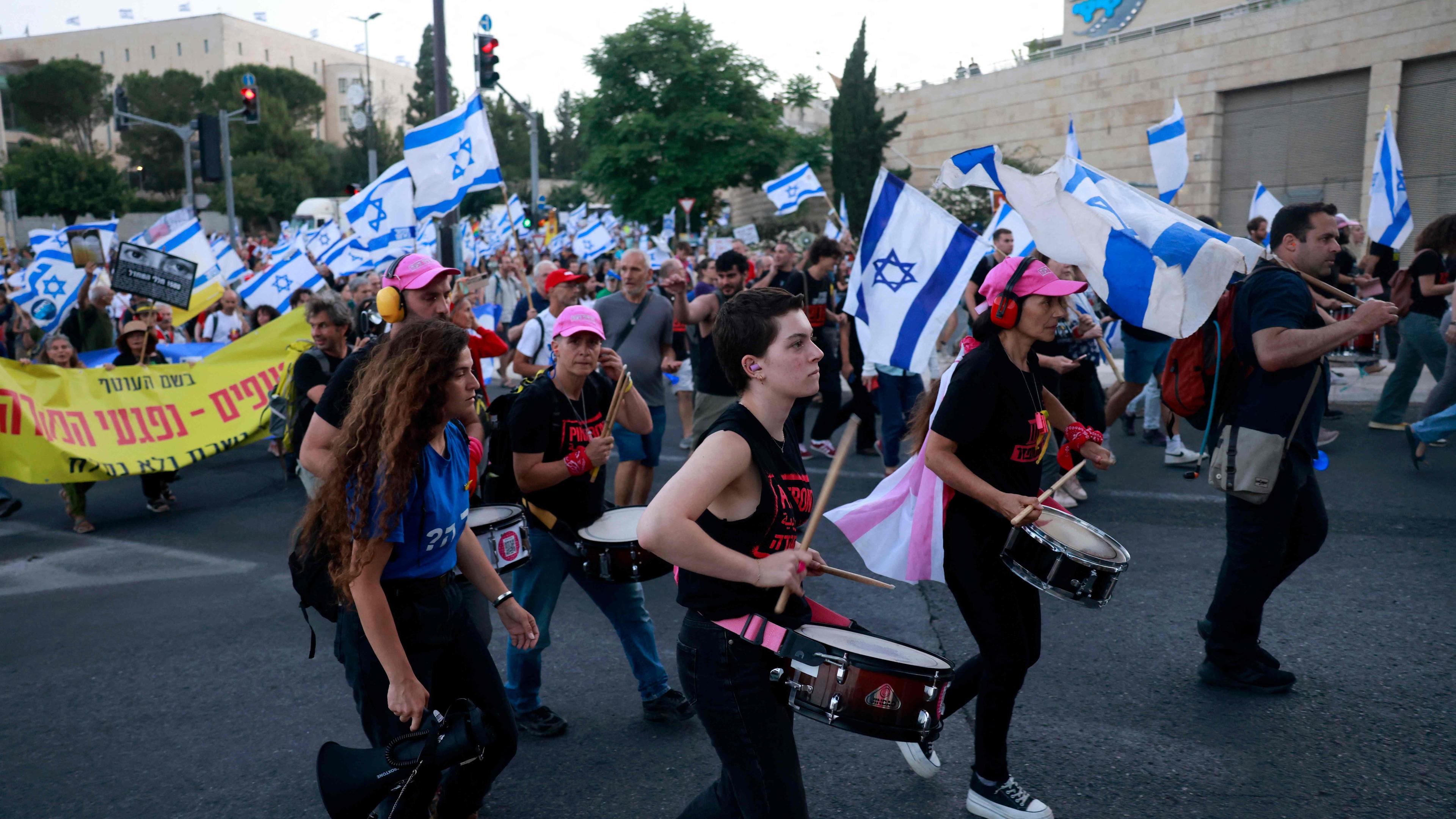Israelis protest against Prime Minister Benjamin Netanyahu's government in Jerusalem, on May 20, 2024, amid the ongoing conflict in the Gaza Strip between Israel and the Palestinian militant Hamas movement. (Photo by Menahem Kahana / AFP)