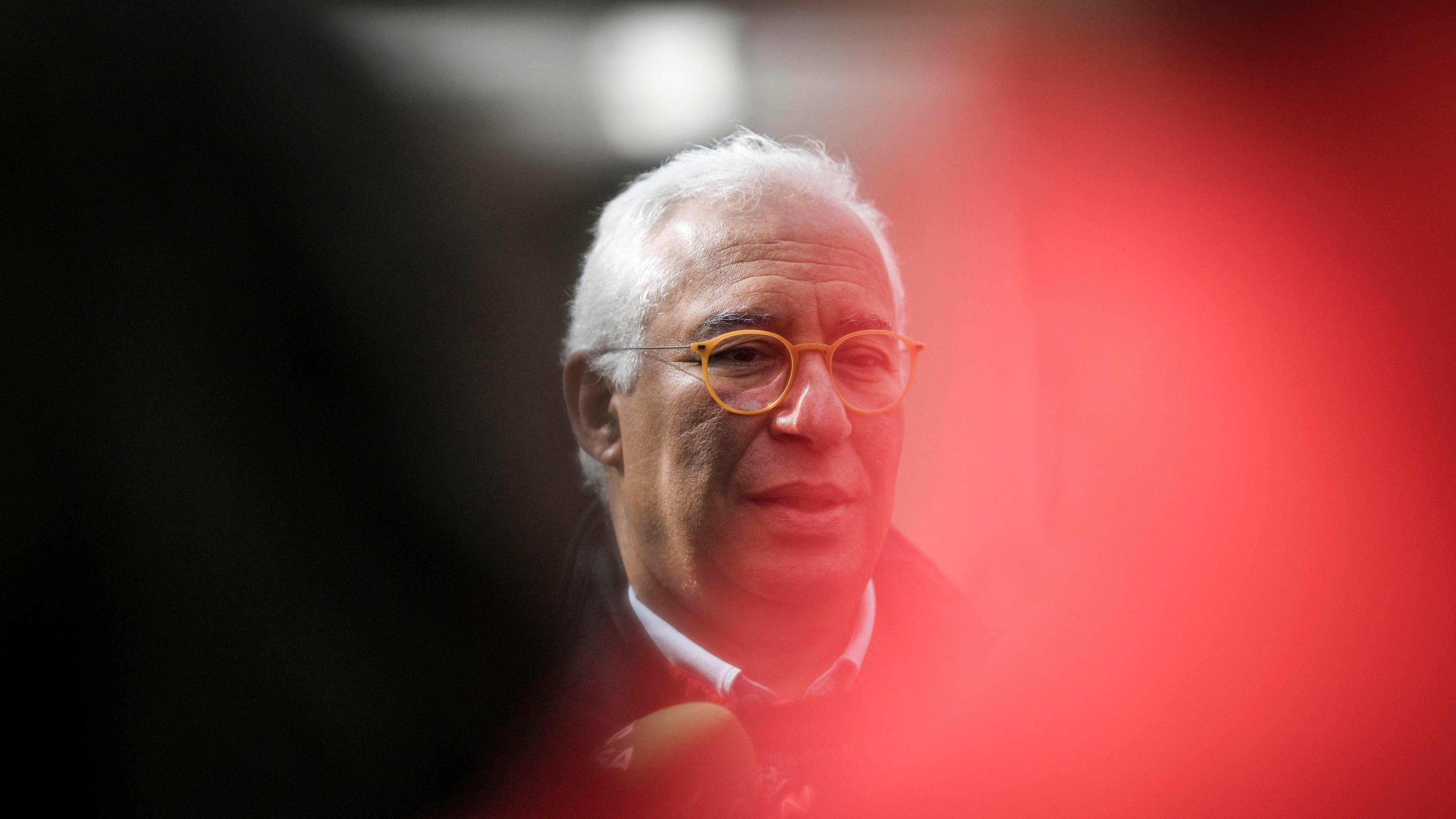TOPSHOT - Outgoing Portuguese Prime Minister Antonio Costa speaks to the press after cast his ballot at a polling station in Benfica, Lisbon, during the legislative elections held on March 10, 2024 in Portugal. Voters in Portugal go to the polls today in an early election that could see the country join the shift to the right seen across Europe after eight years of Socialist rule. Final polls published on March 8, 2024 indicate the centre-right Democratic Alliance (AD) is narrowly ahead of the Socialist Party (PS) but short of an outright majority in parliament, and that far-right party Chega could be the kingmaker. Nevertheless, results remain wide open due to the large number of undecided voters. (Photo by PATRICIA DE MELO MOREIRA / AFP)