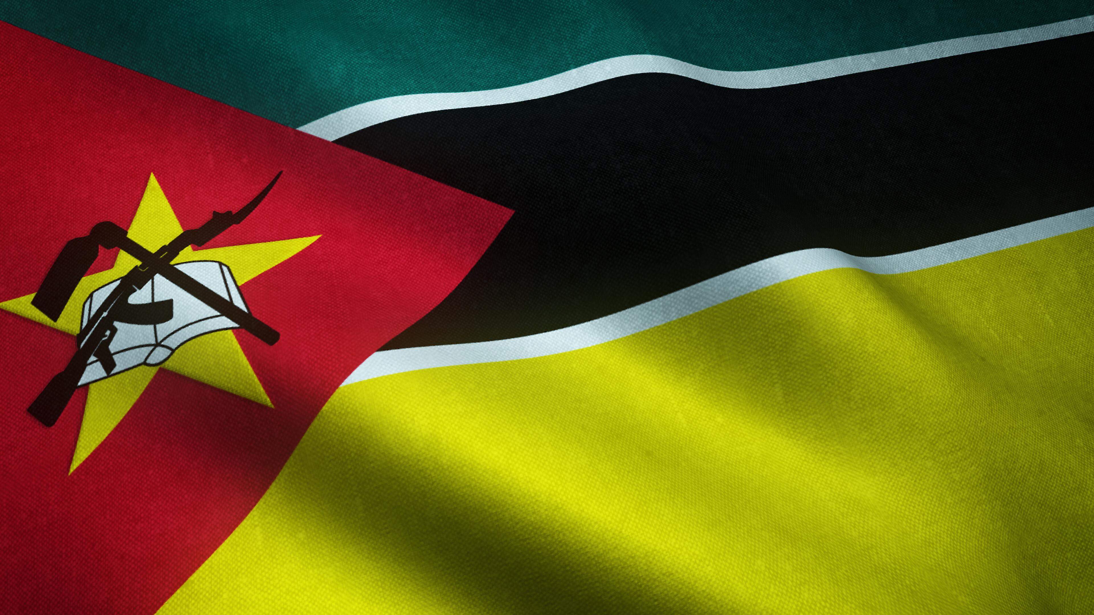 A closeup shot of the waving flag of Mozambique with interesting textures