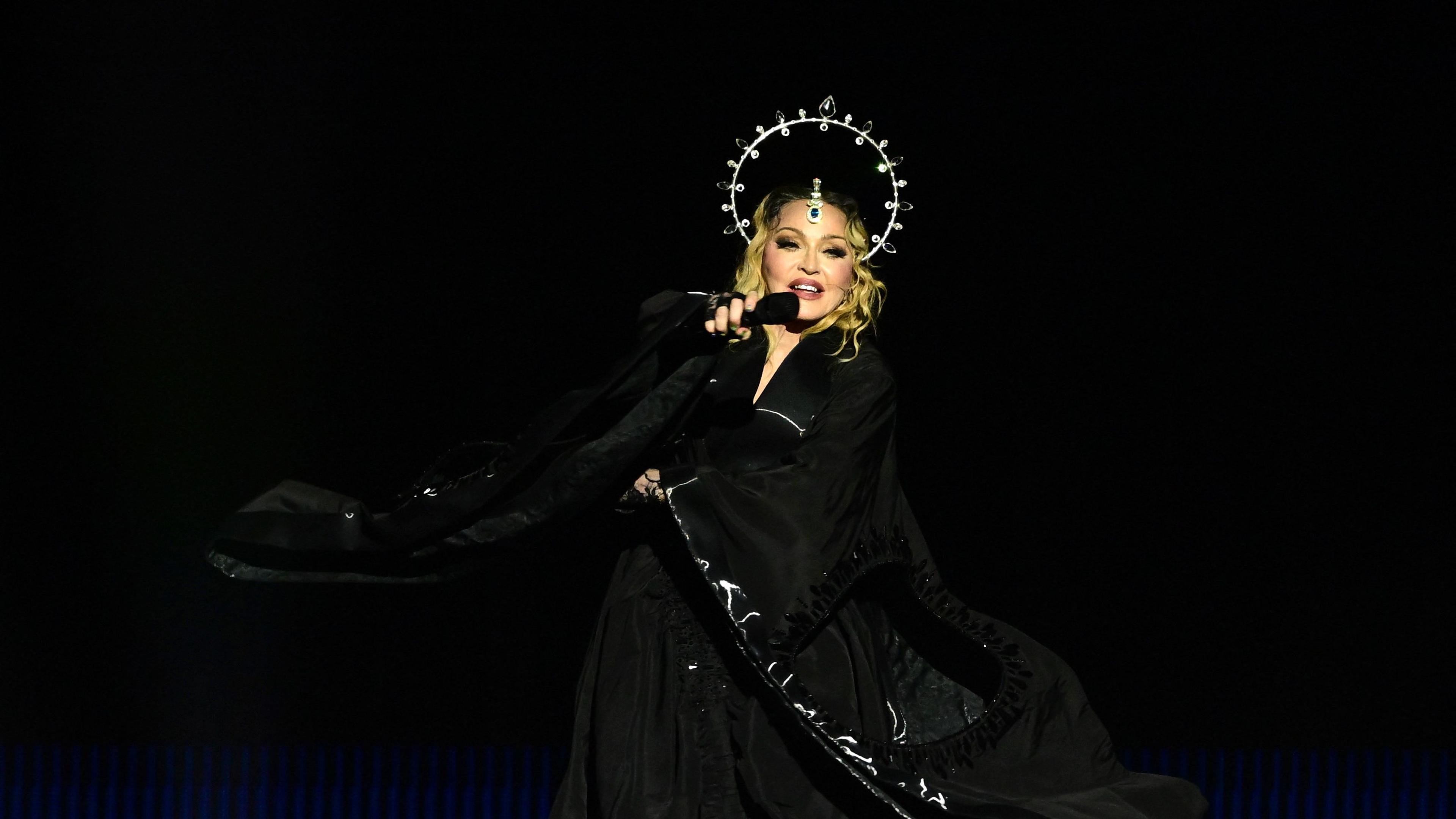 TOPSHOT - US pop star Madonna performs onstage during a free concert at Copacabana beach in Rio de Janeiro, Brazil, on May 4, 2024. . Madonna ended her The Celebration Tour with a performance attended by some 1.5 million enthusiastic fans. (Photo by Pablo PORCIUNCULA / AFP)