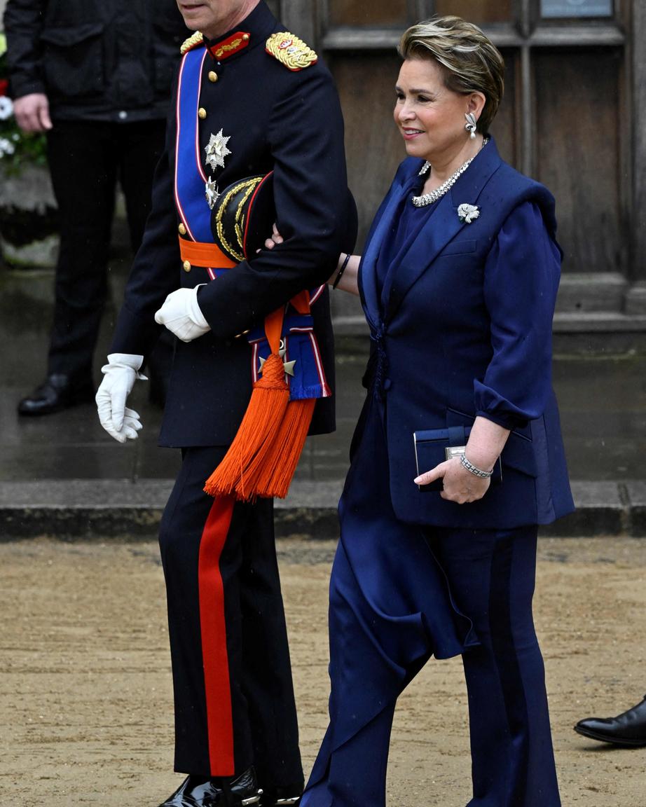 Os grão-duques do Luxmburgo Henri e Maria Teresa à chegada à Abadia de Westminster este sábado de manhã, em Londres.
