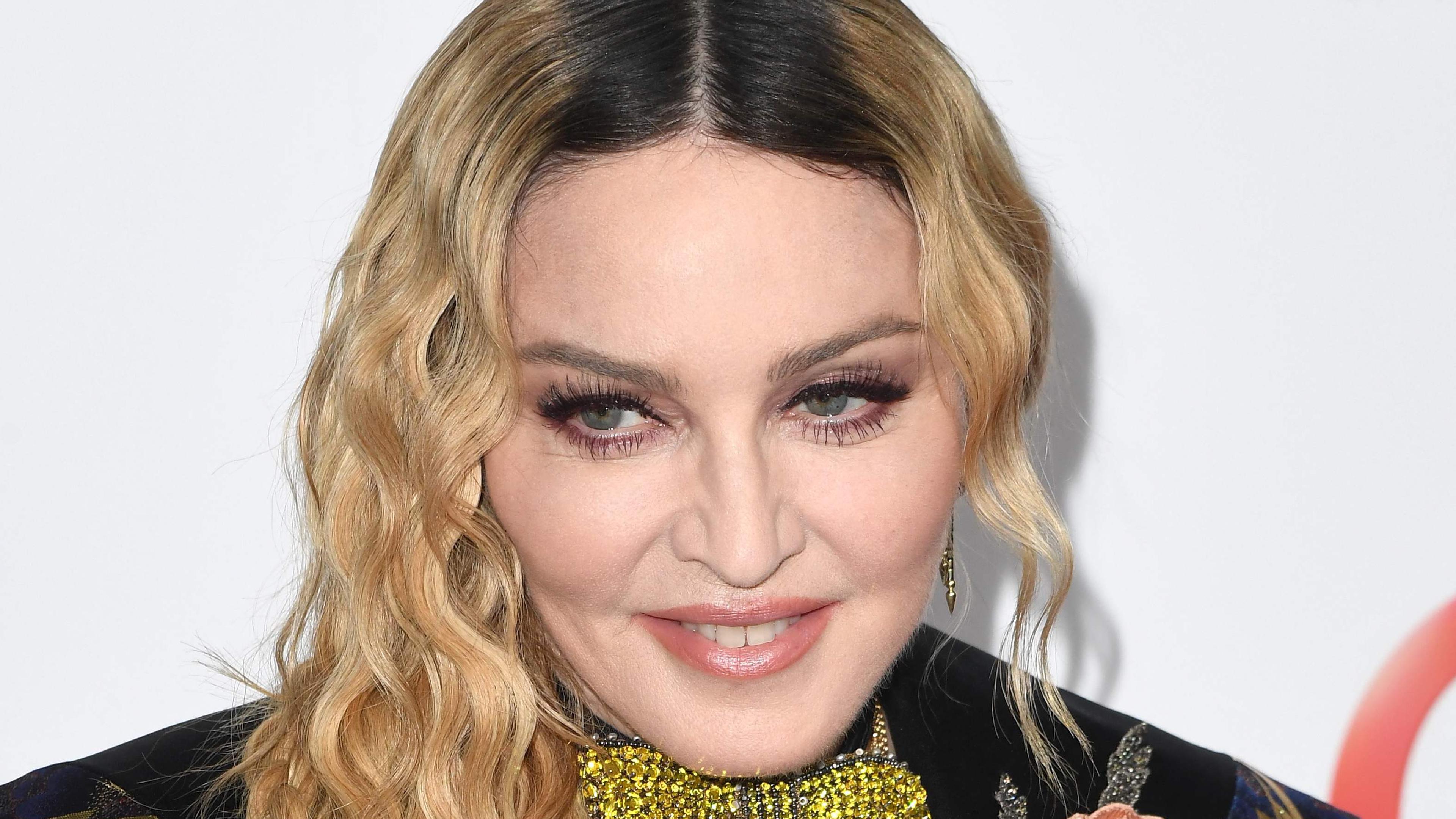 (FILES) Madonna attends the Billboard Women in Music 2016 event on December 9, 2016 in New York City. Madonna is recovering after falling ill with a "serious bacterial infection" that landed her in an intensive care unit for several days, her manager Guy Oseary said in a statement posted to social media on June 28.
"Her health is improving, however she is still under medical care," he said. "A full recovery is expected."
Oseary said the pop icon's "Celebrations" tour, due to start July 15 in Vancouver, was postponed until further notice. (Photo by ANGELA WEISS / AFP)