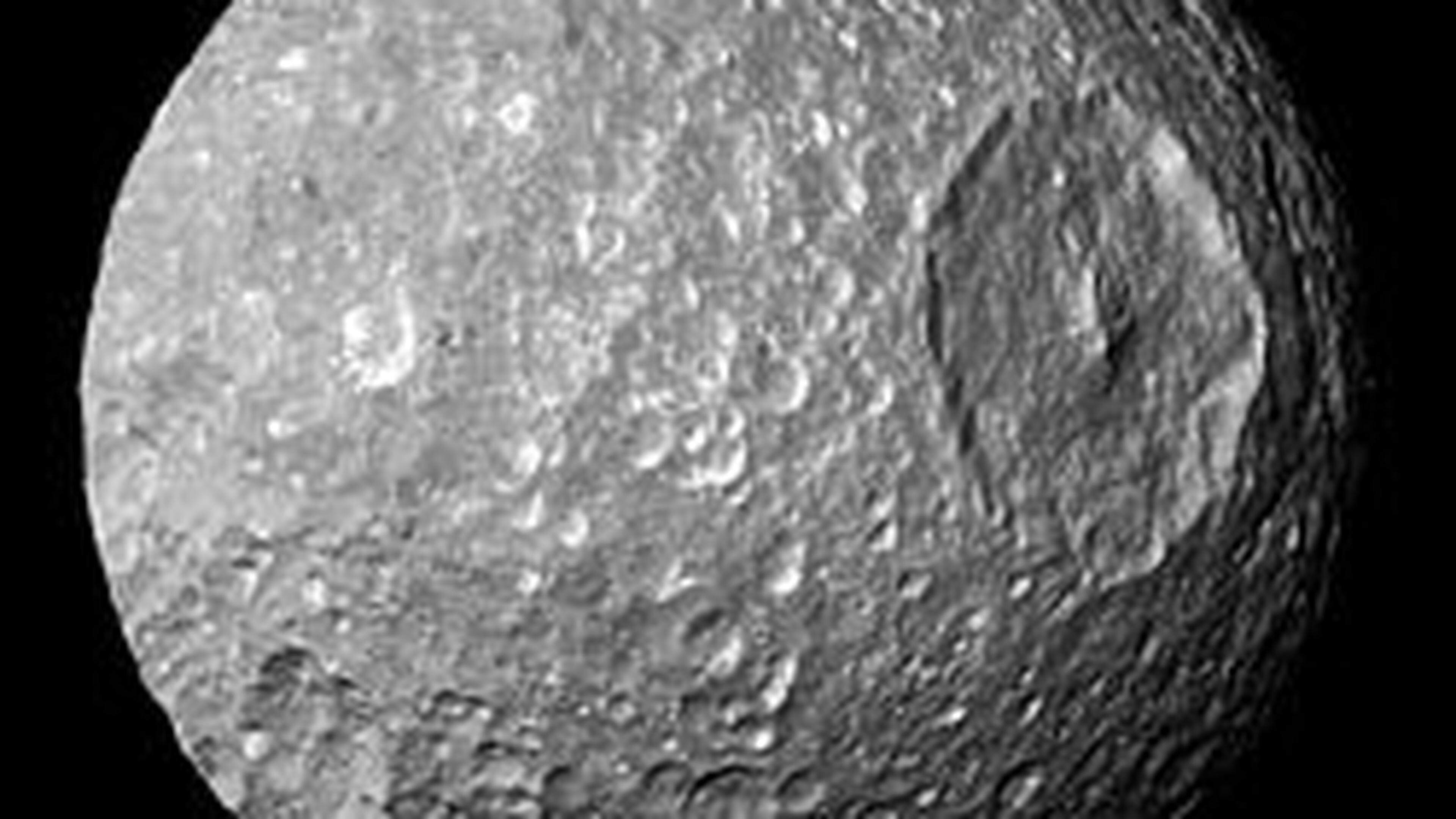 Mimas, Moon of Saturn, Hides Vast Ocean Under Icy Surface: Study